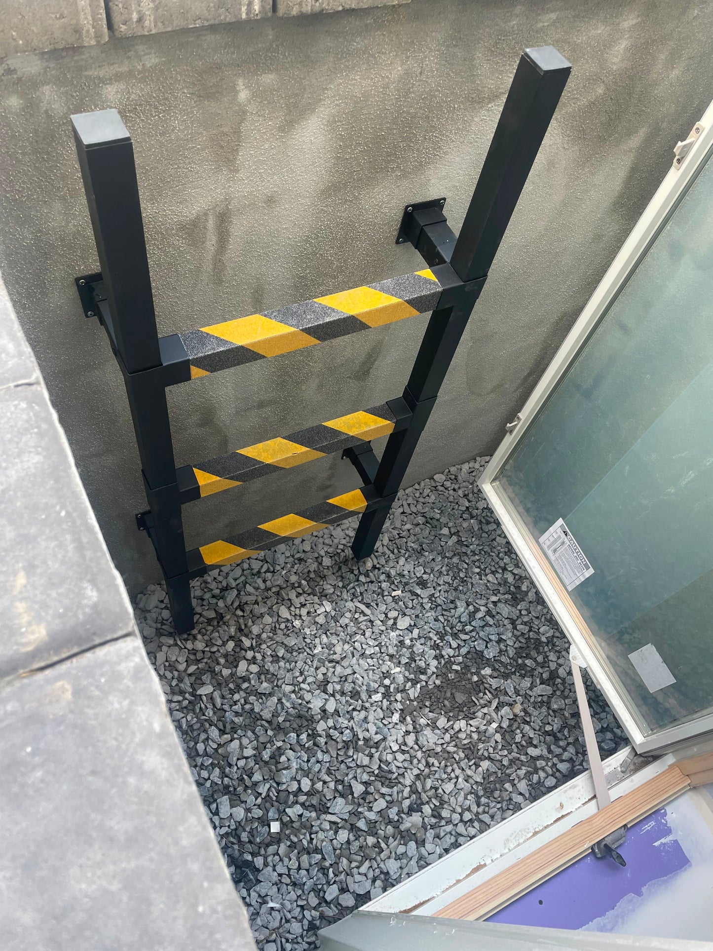 IRONNEST SYSTEM™ STEP™ Egress Ladder | Custom Aluminum Basement Window Well Ladder